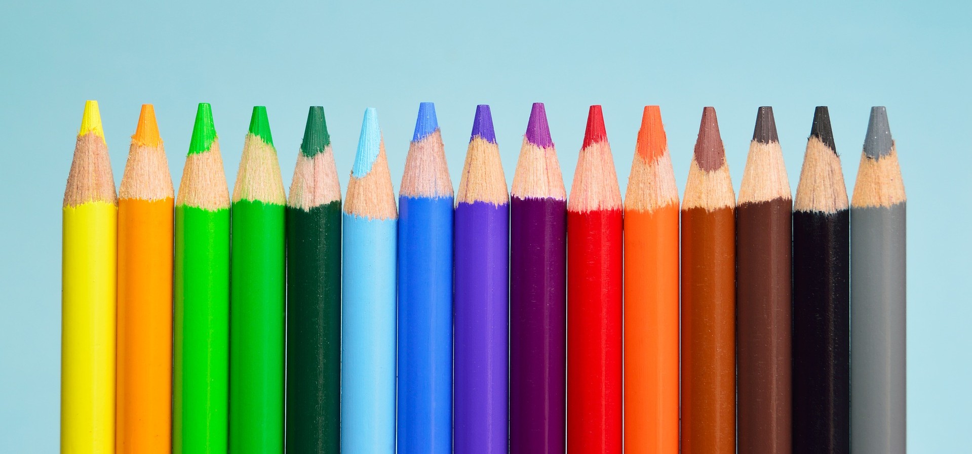 an array of sharpened colored pencils